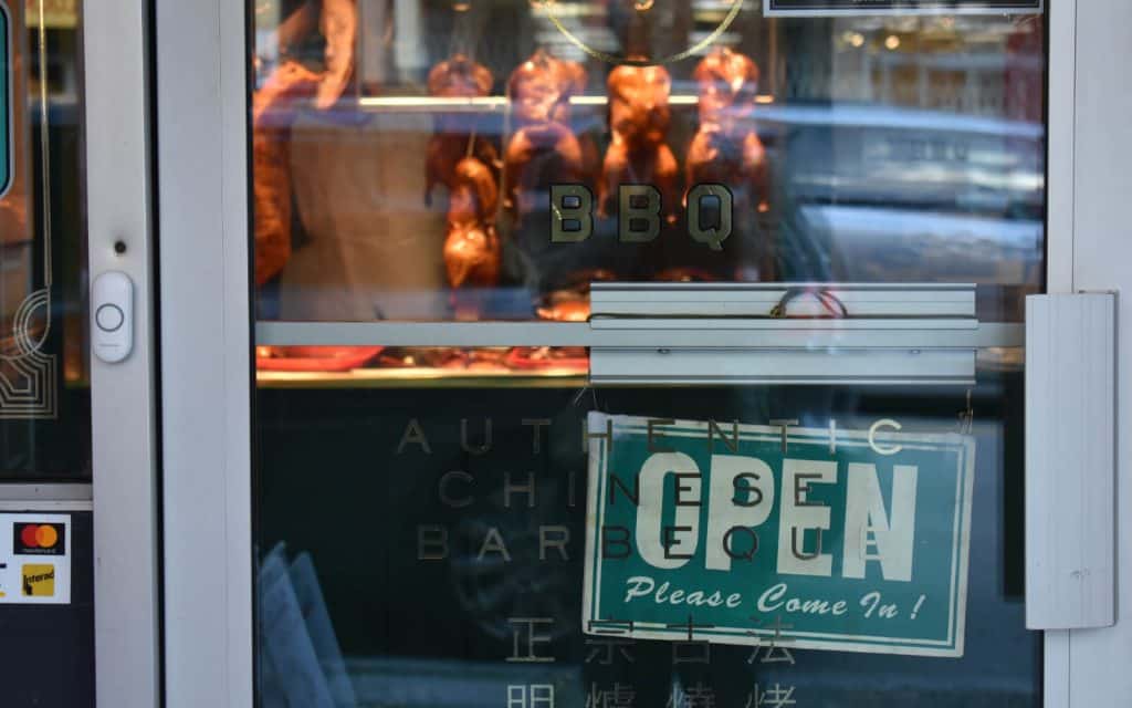 bbq duck hanging in a window at a restaurant in chinatown vancouver bc canada