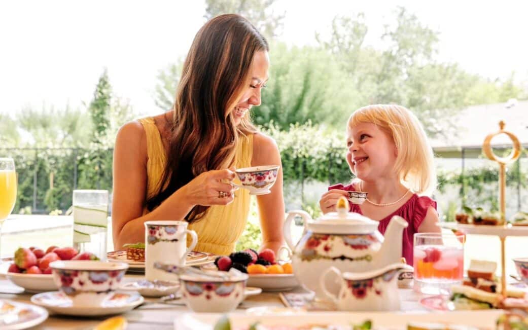 woman and child sharing tea and baked goods at empress victoria