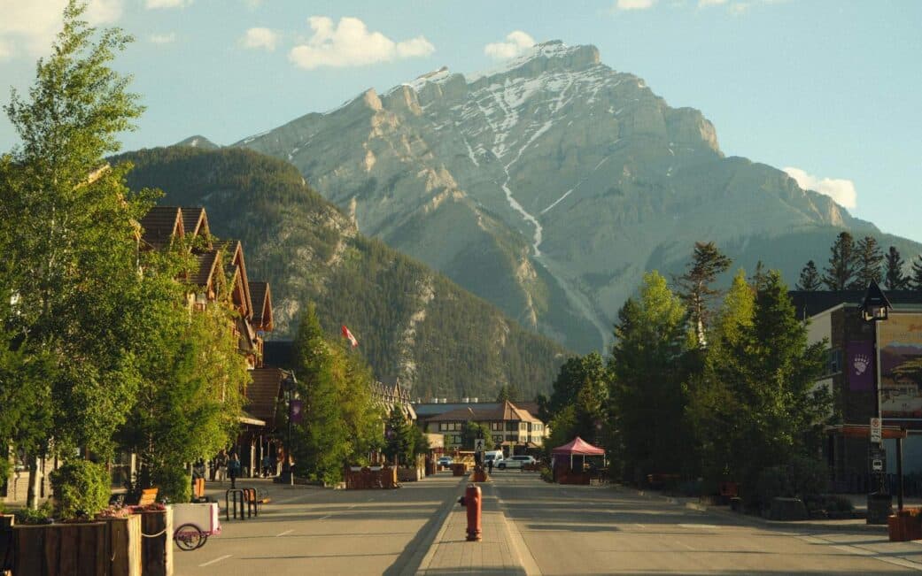 Banff Avenue, with the Rocky Mountain peaks in the background.