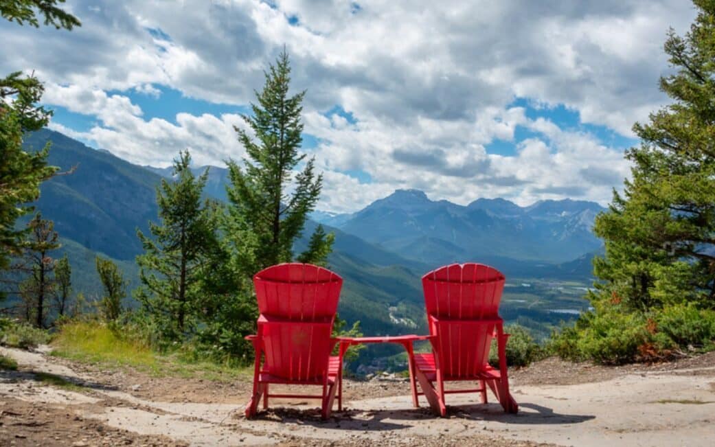 A pair of chairs at the top of Tunnel Mountain overlooking the Bow Valley.