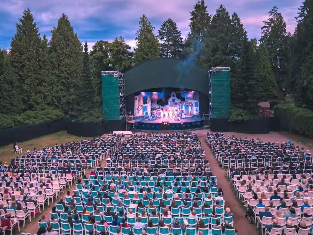 live show at theatre under the stars packed with live audience during a beautiful sunset