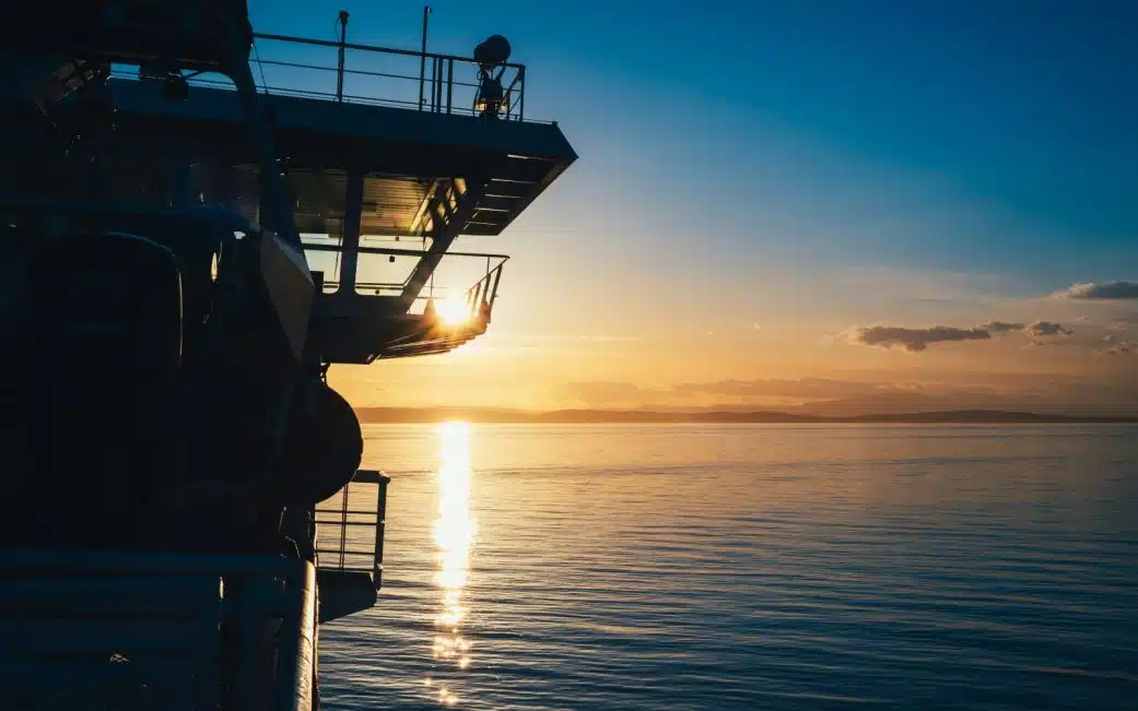 A ferry heads across the Salish Sea on a Vancouver Island road trip from Vancouver.