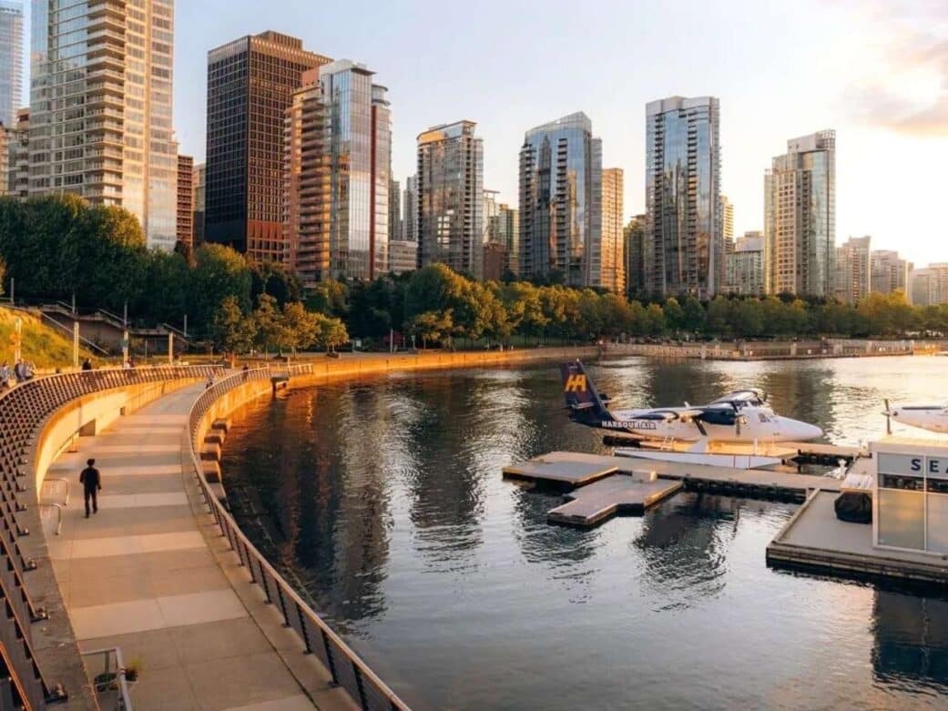 that’s coal harbour vancouver, right near the seawall and floatplane terminal. golden hour lights up the skyline perfectly here—especially if you’re walking toward stanley park or watching a harbour air seaplane take off.